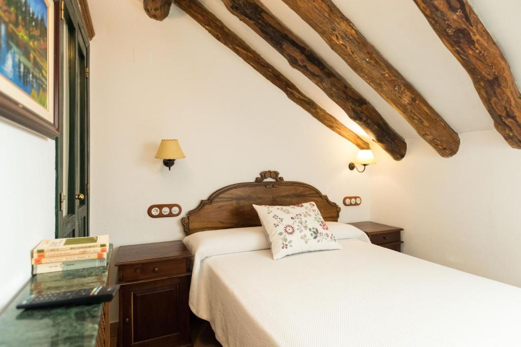 Postel nebo postele na pokoji v ubytování CALERILLA Hotel
