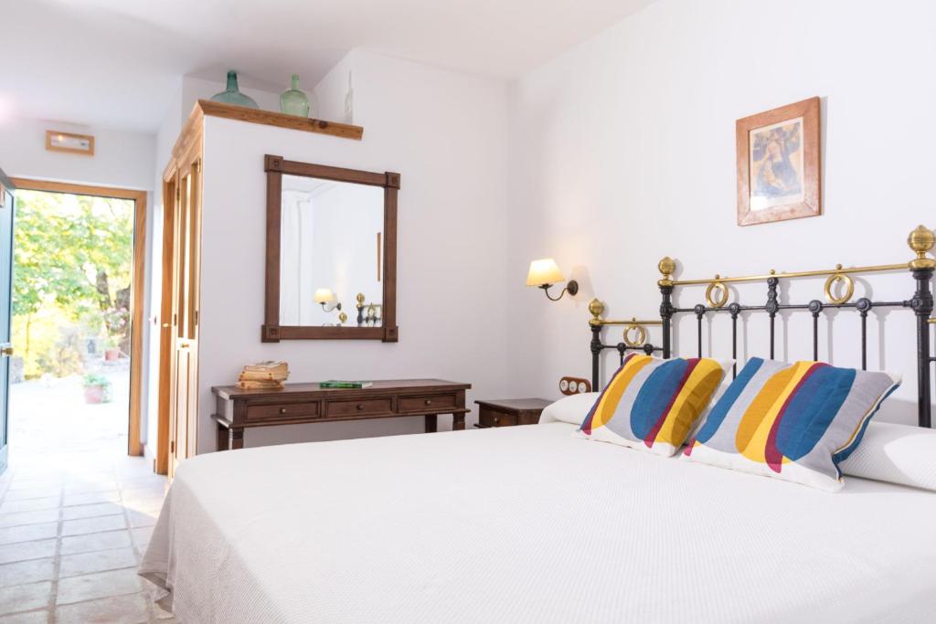 Postel nebo postele na pokoji v ubytování CALERILLA Hotel