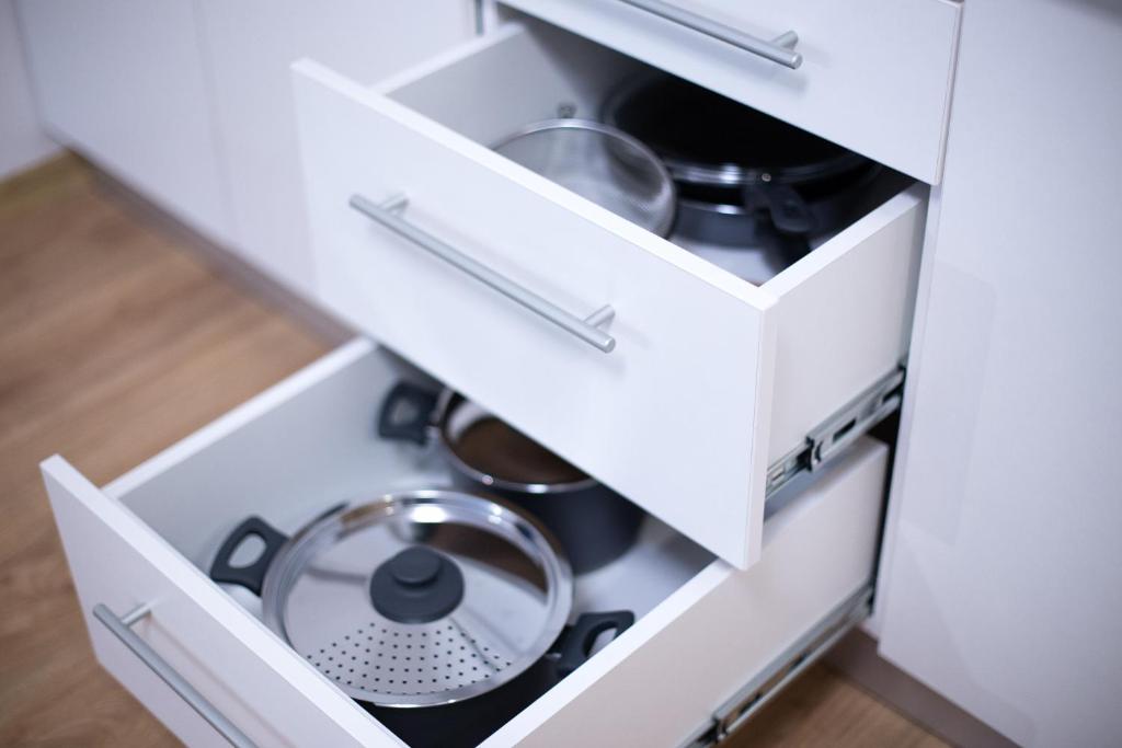 Kuchyň nebo kuchyňský kout v ubytování Apartmány Na Čtvrtích
