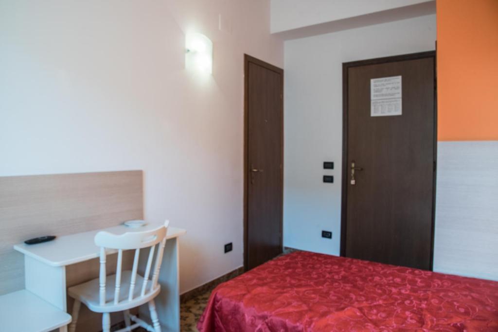 Postel nebo postele na pokoji v ubytování Albergo Carpino