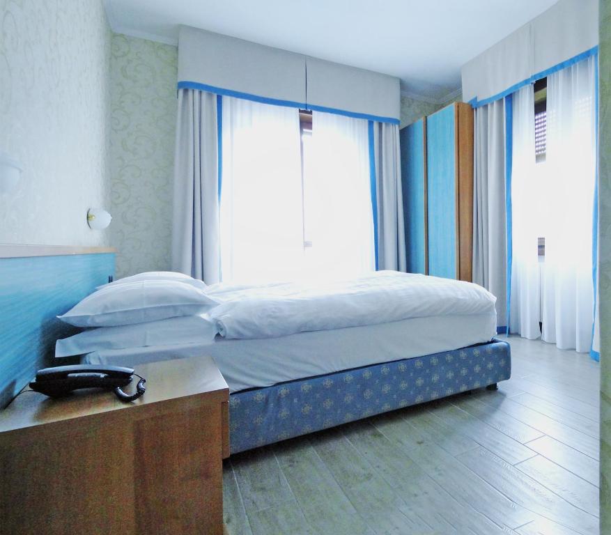 Postel nebo postele na pokoji v ubytování Hotel Sole - Limone