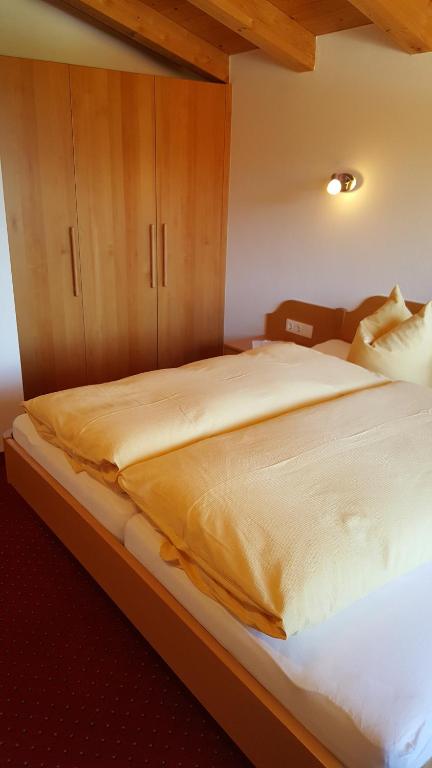 Postel nebo postele na pokoji v ubytování Glaserhof