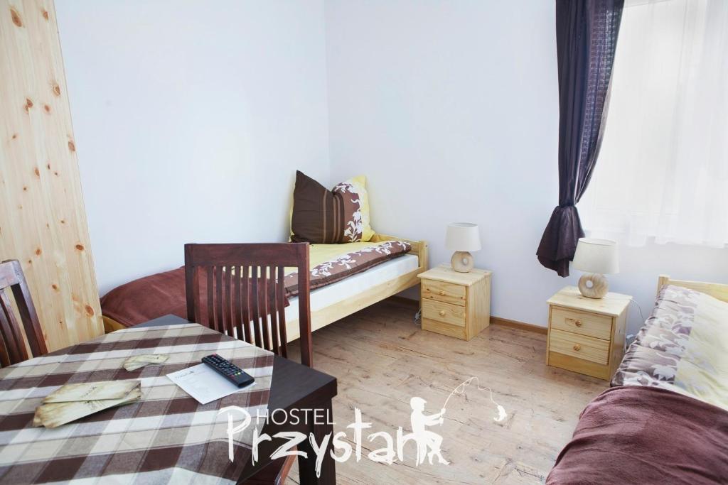 Postel nebo postele na pokoji v ubytování Hostel Przystan