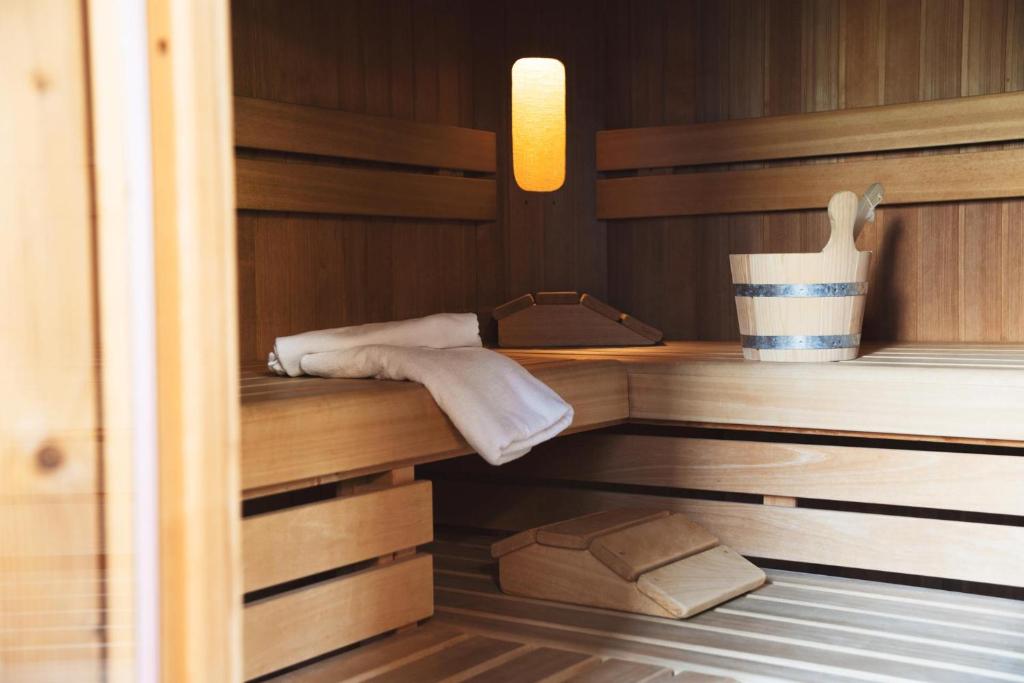 Postel nebo postele na pokoji v ubytování Bergidyll & Hotel Trofana