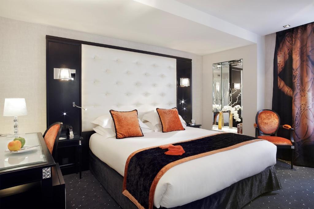 Een bed of bedden in een kamer bij Maison Albar - Le Diamond