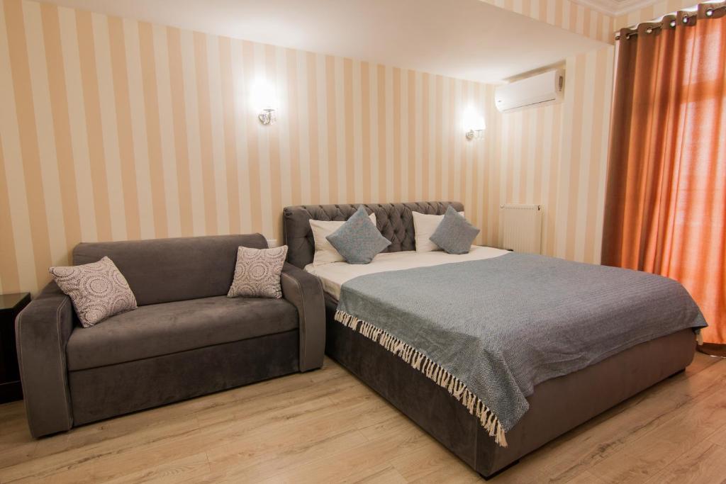 Postel nebo postele na pokoji v ubytování Klassik Hotel