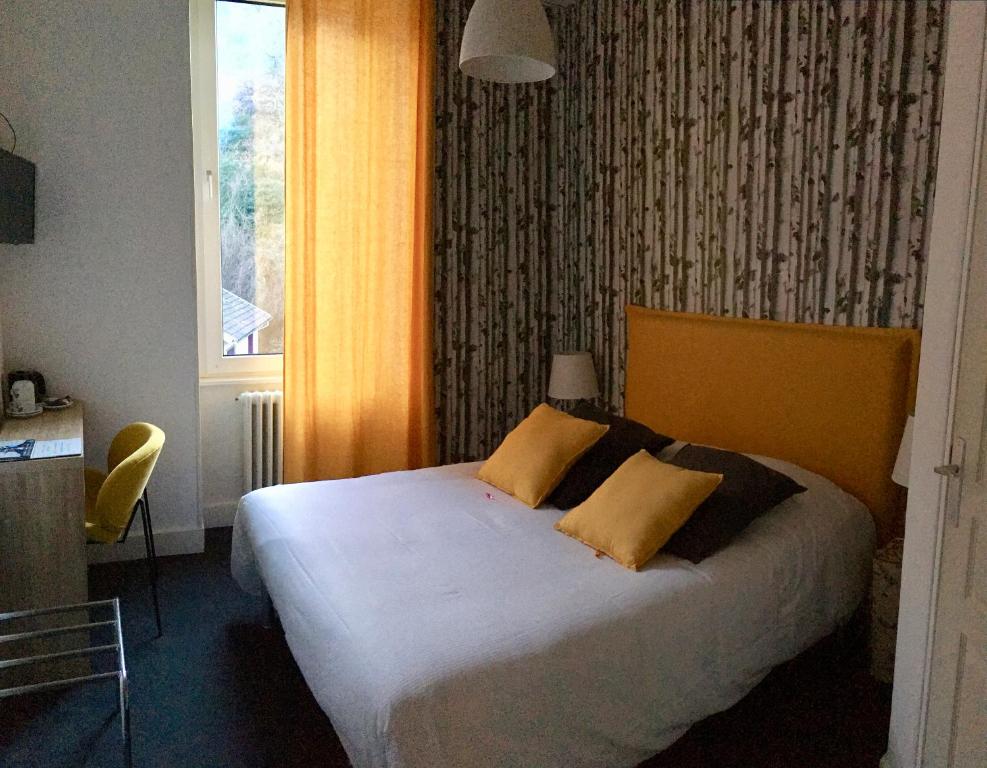 Posteľ alebo postele v izbe v ubytovaní Hotel Regina