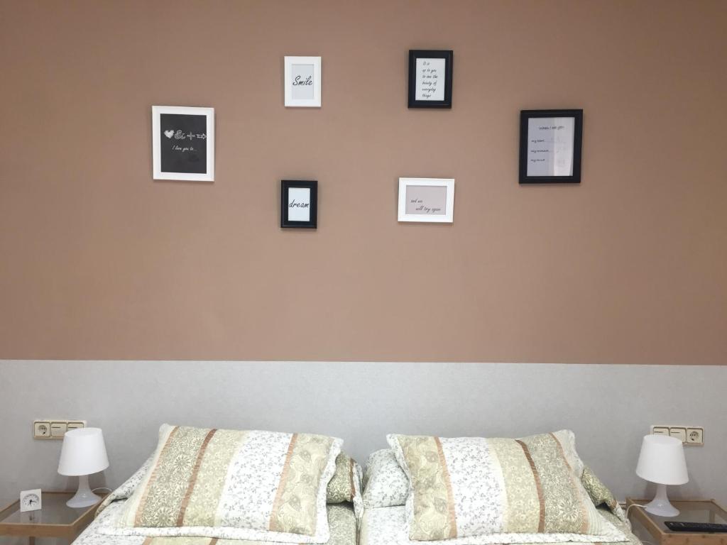 Una cama o camas en una habitación de Alojamiento Jaén