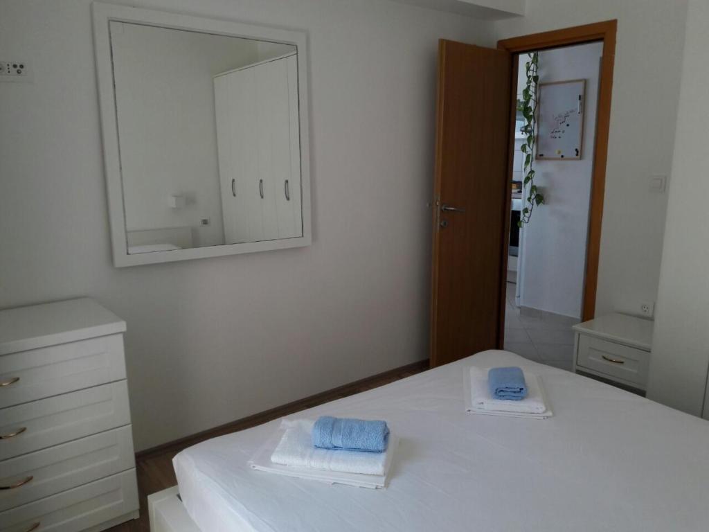 Postel nebo postele na pokoji v ubytování Apartment Leon