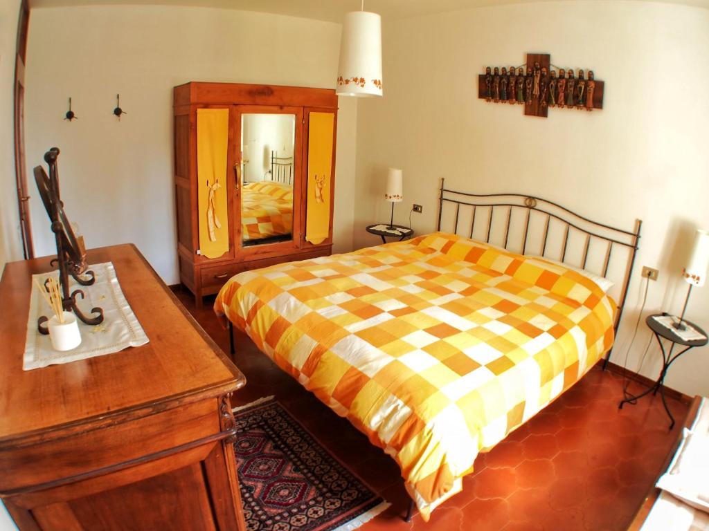 Postel nebo postele na pokoji v ubytování Casa Vacanza Pratolungo