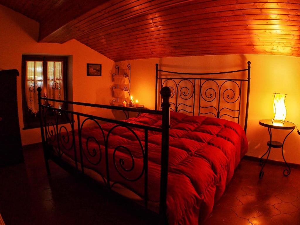 Postel nebo postele na pokoji v ubytování Casa Vacanza Pratolungo