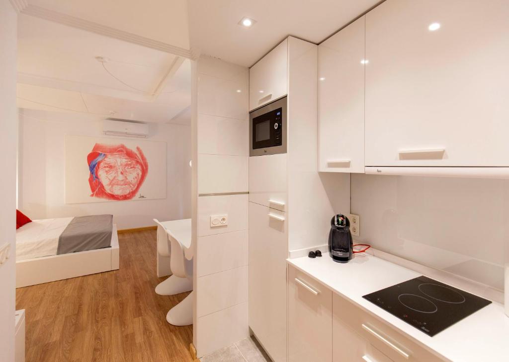 Posteľ alebo postele v izbe v ubytovaní Apartamentos Ele San Justo Plaza