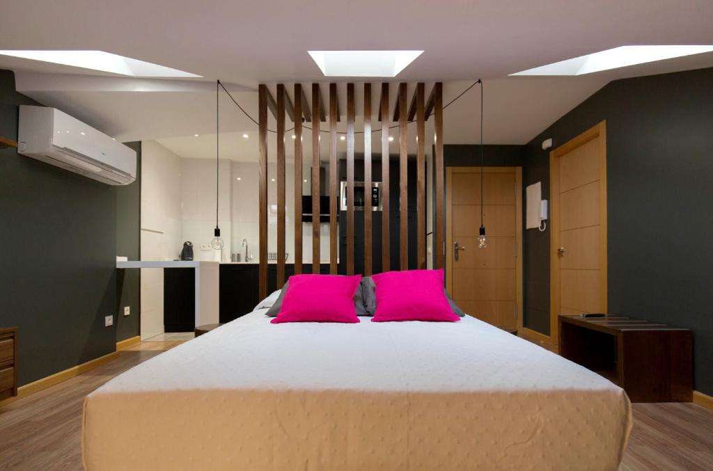 Posteľ alebo postele v izbe v ubytovaní Apartamentos Ele San Justo Plaza