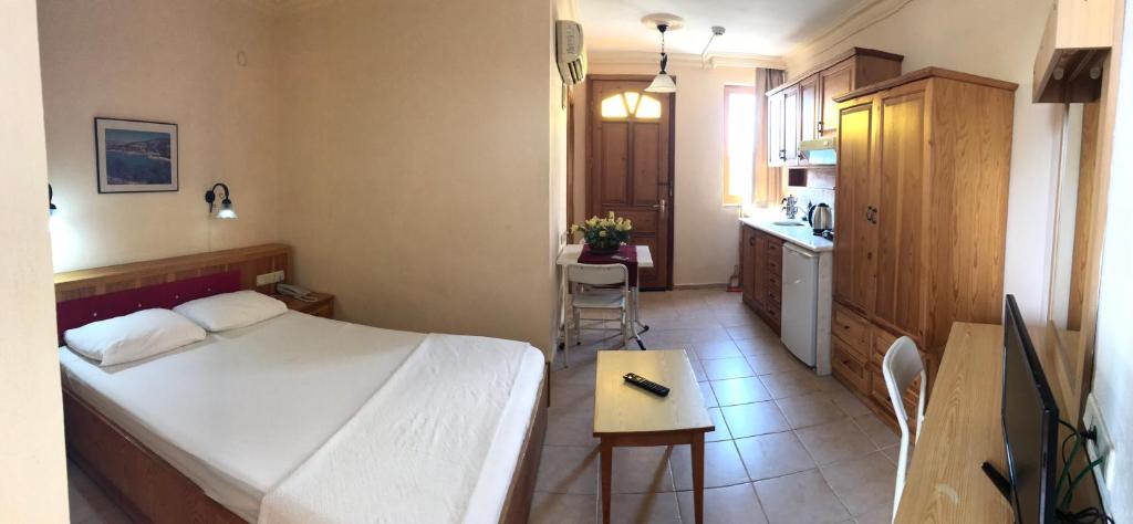 Postel nebo postele na pokoji v ubytování Nar Apart Hotel