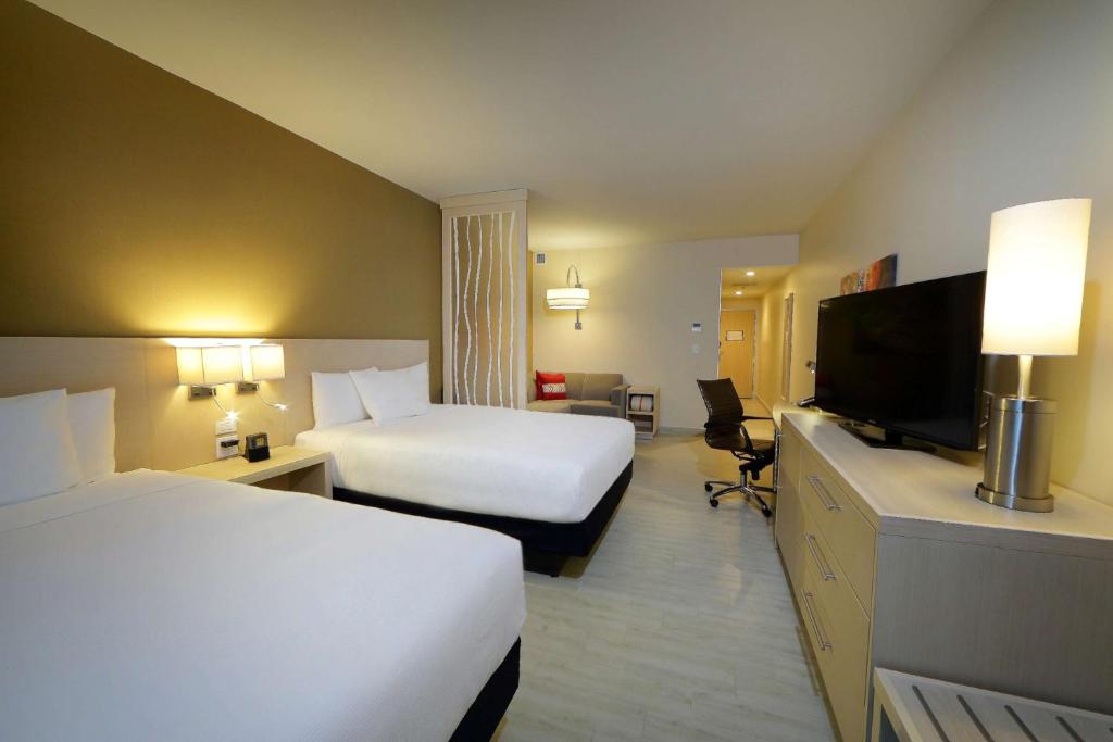 Uma cama ou camas num quarto em Hyatt Place Tegucigalpa
