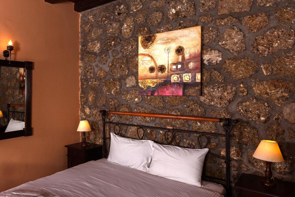 Postel nebo postele na pokoji v ubytování Pera Alonia Guest House