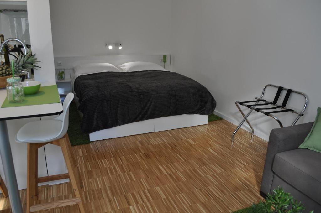 Posteľ alebo postele v izbe v ubytovaní Studio Apartments City&style