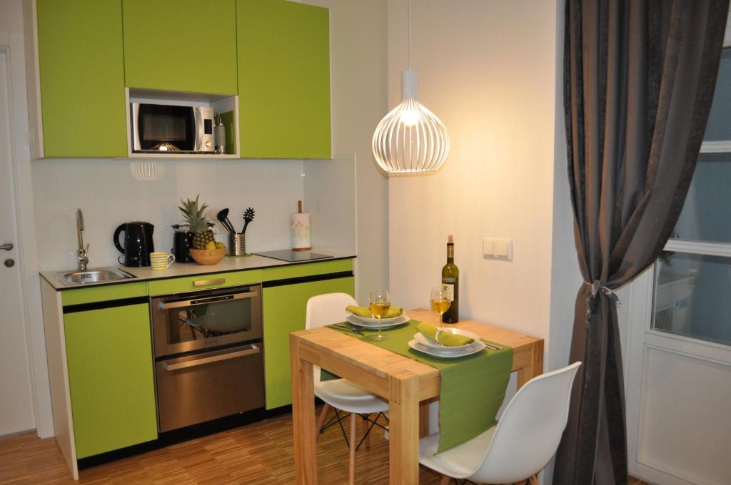 Kuchyňa alebo kuchynka v ubytovaní Studio Apartments City&style