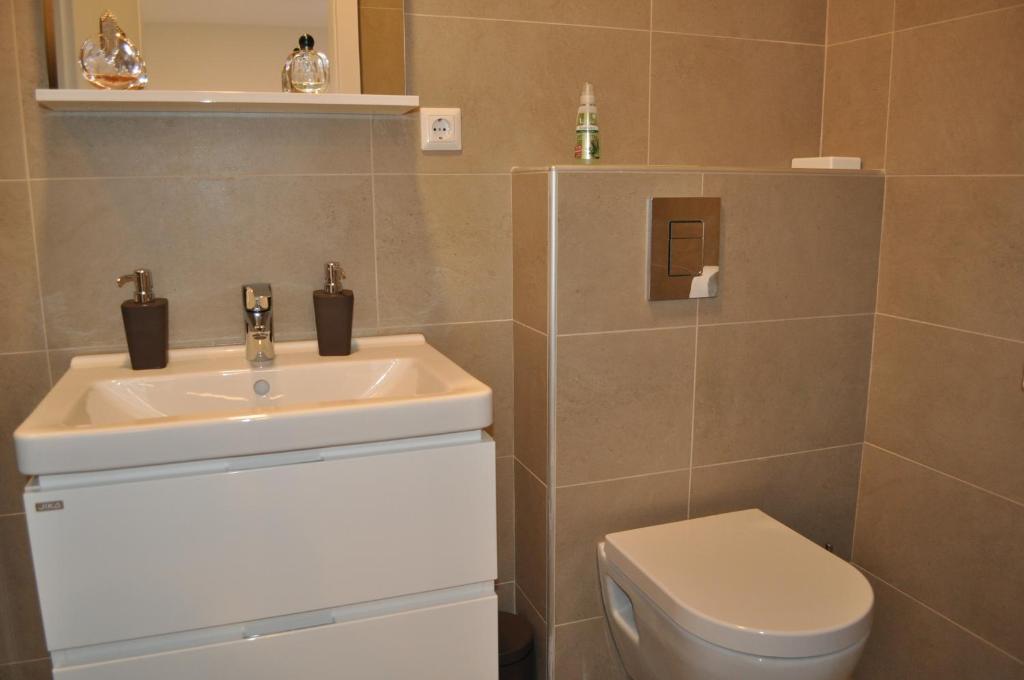 Kúpeľňa v ubytovaní Studio Apartments City&style