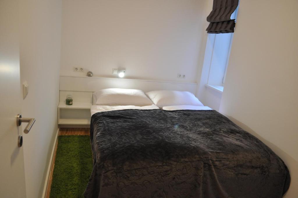 Posteľ alebo postele v izbe v ubytovaní Studio Apartments City&style
