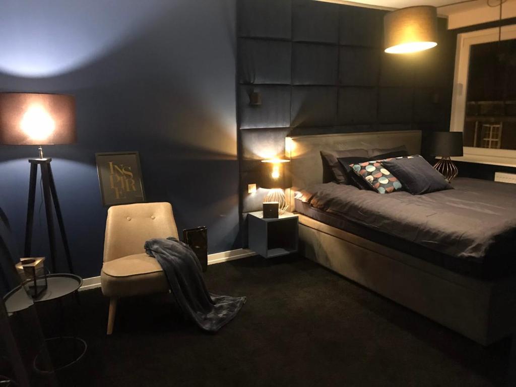 Posteľ alebo postele v izbe v ubytovaní Apartament Mozart