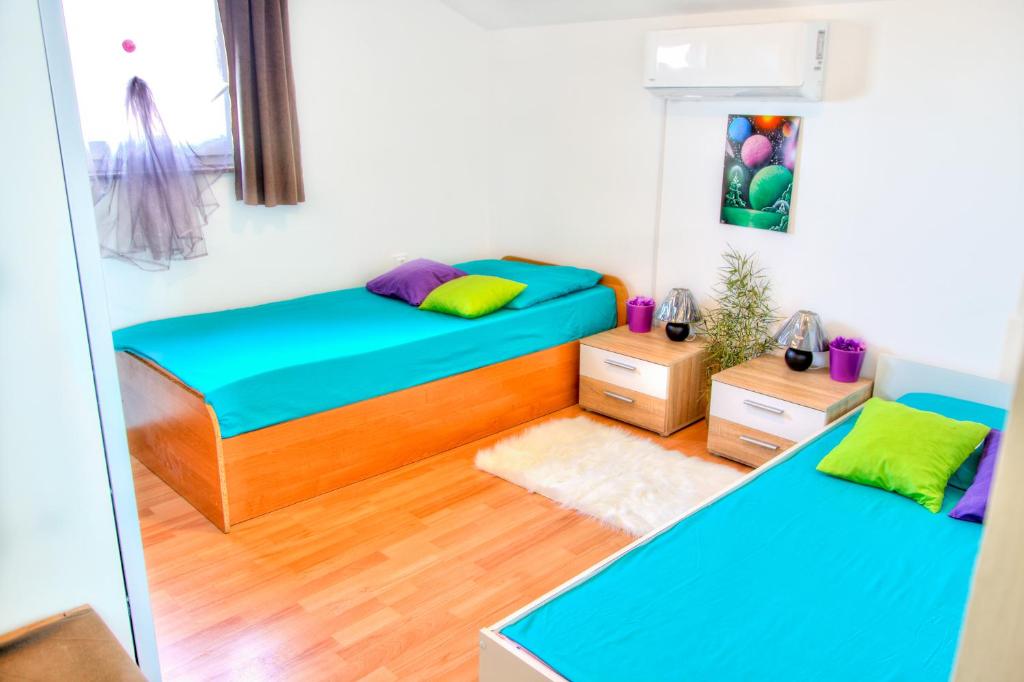 Postel nebo postele na pokoji v ubytování Ema Holiday Home