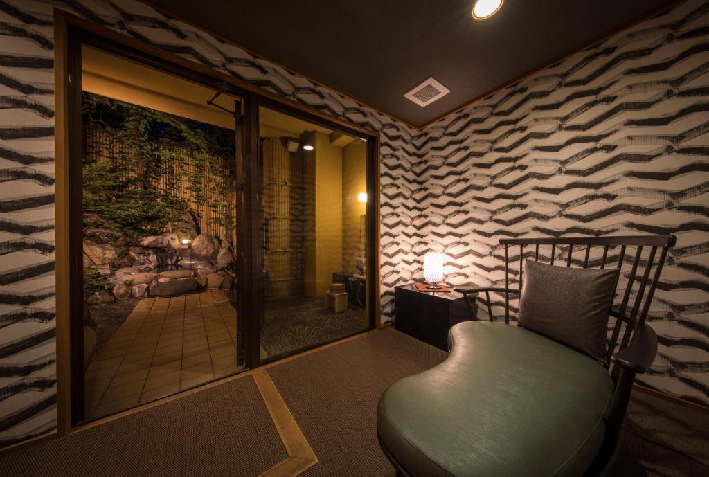 Posezení v ubytování Hotel Shirakawa Yunokura