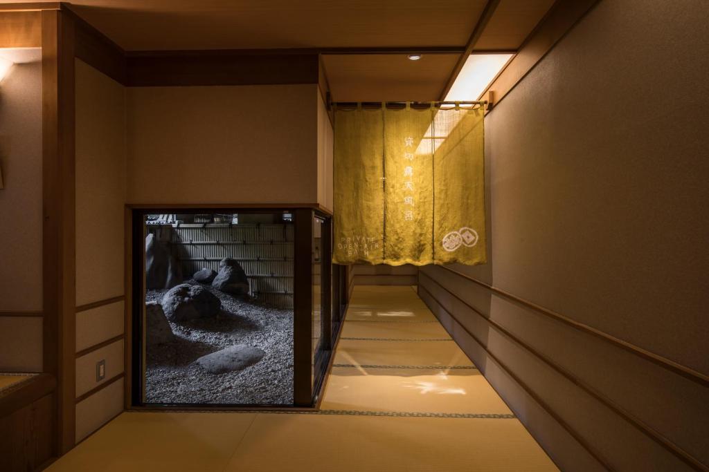 TV a/nebo společenská místnost v ubytování Hotel Shirakawa Yunokura