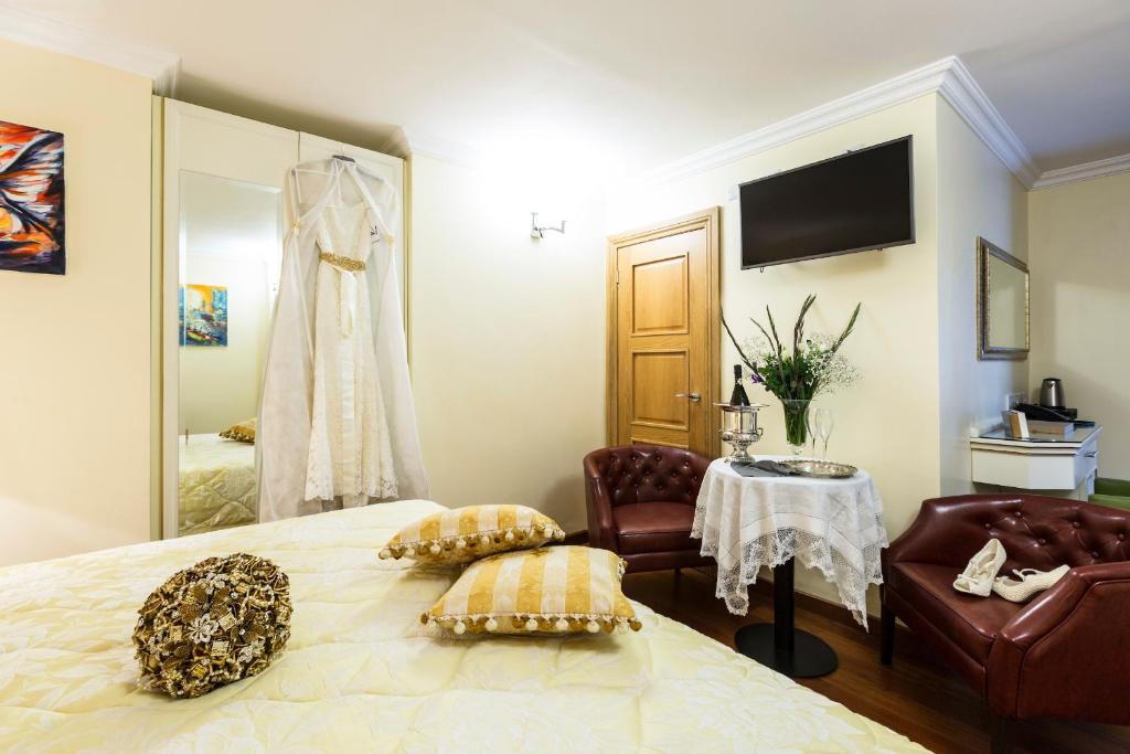 Postel nebo postele na pokoji v ubytování Linton Hotel Luton