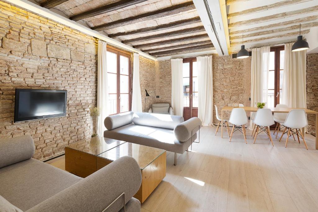 TV a/nebo společenská místnost v ubytování Decô Apartments Barcelona-Born Apt.