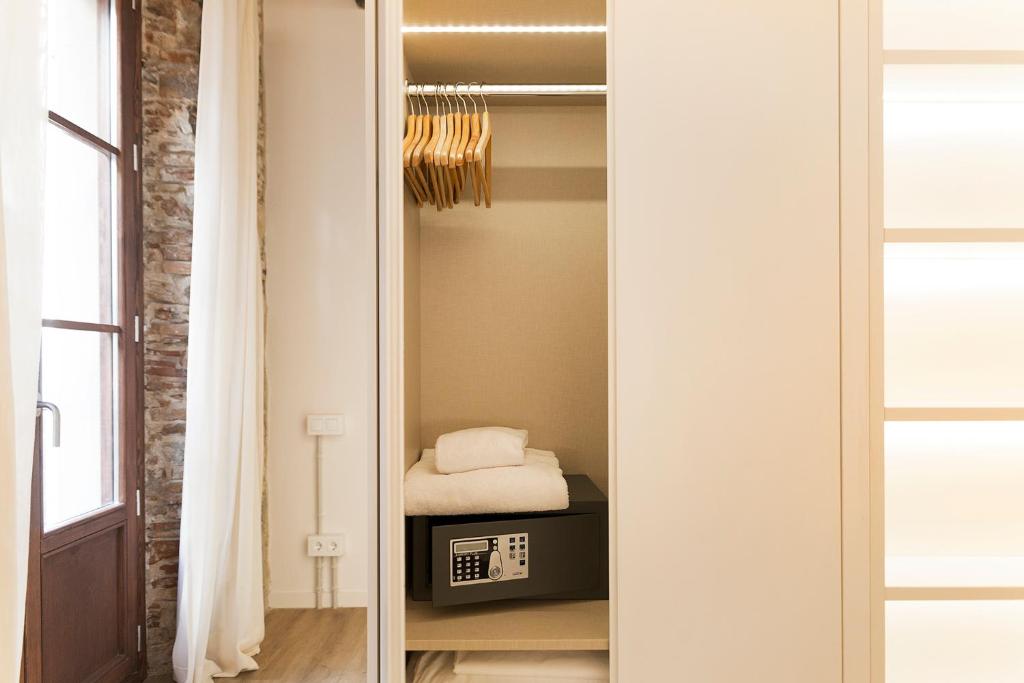 Postel nebo postele na pokoji v ubytování Decô Apartments Barcelona-Born Apt.