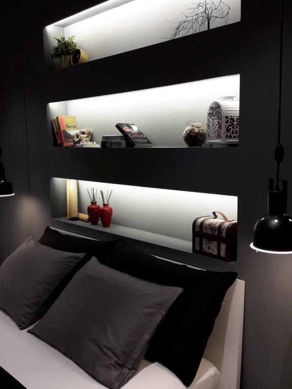 A bed or beds in a room at Super Stylish Apartments in Syntagma Square!