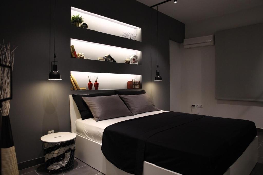 A bed or beds in a room at Super Stylish Apartments in Syntagma Square!