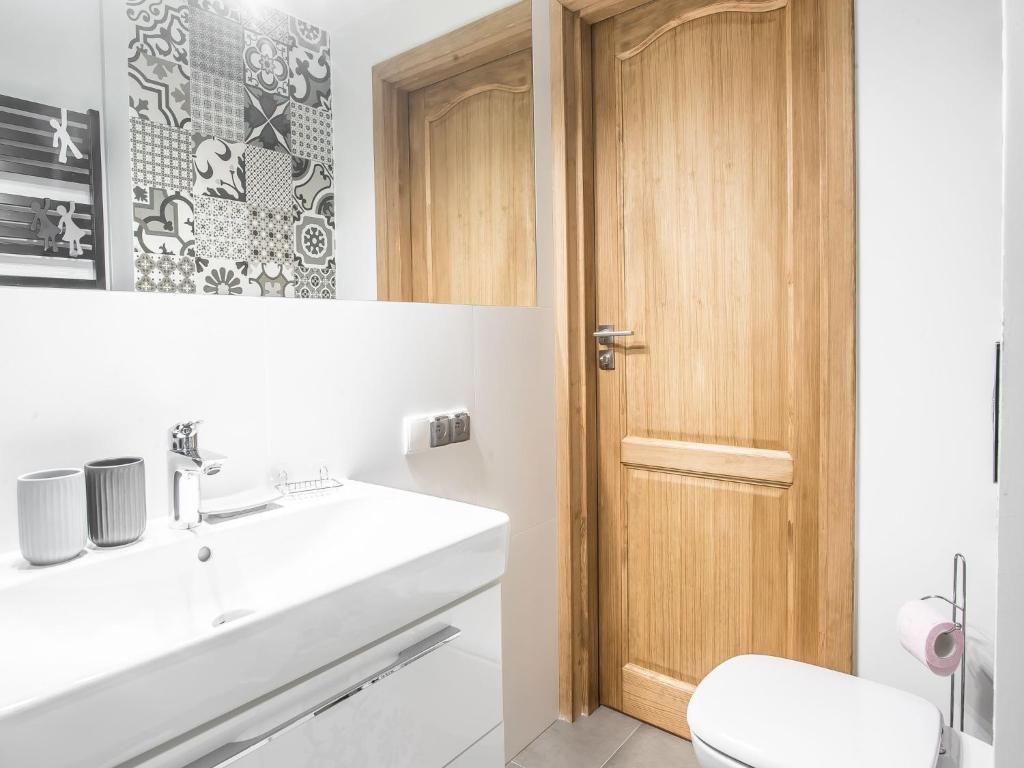 Kúpeľňa v ubytovaní TatryTop Apartamenty Szymaszkowa Ski Premium