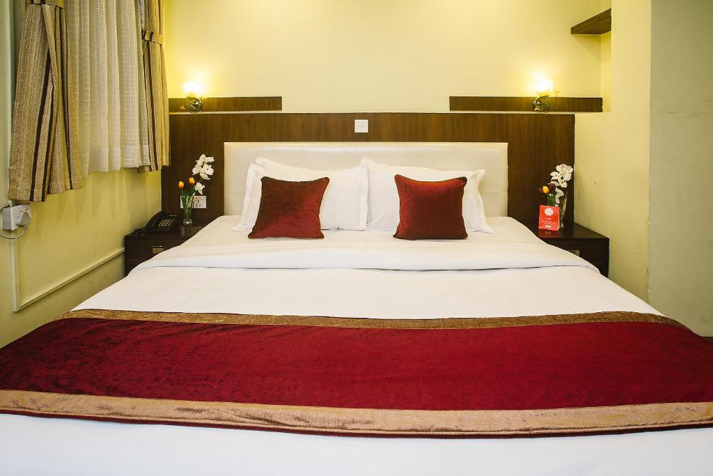 Postel nebo postele na pokoji v ubytování Backyard Hotel
