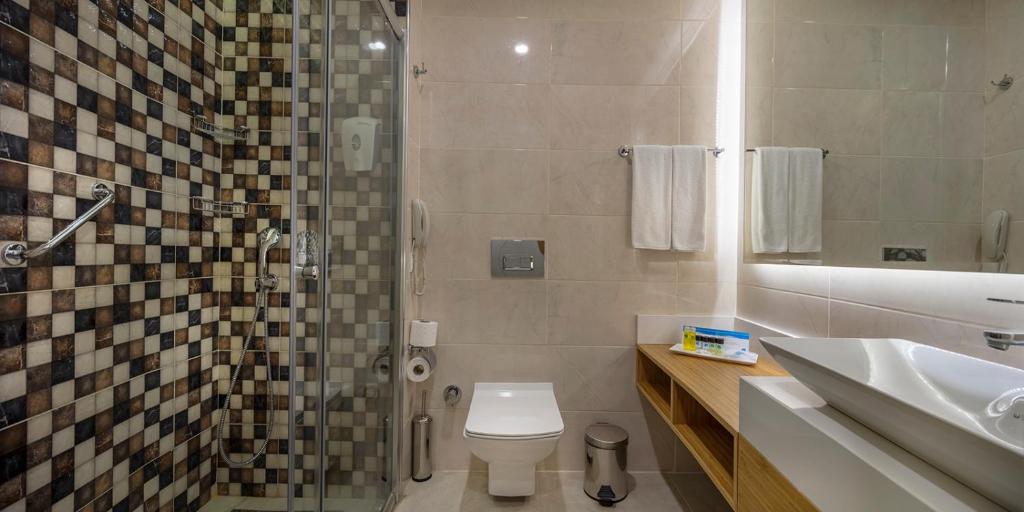 Koupelna v ubytování Dosinia Luxury Resort-Ultra All Inclusive