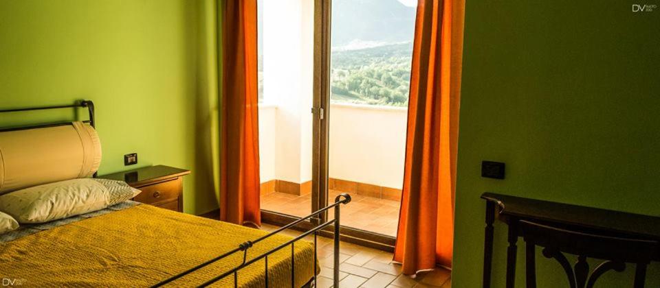Postel nebo postele na pokoji v ubytování Santa Giusta
