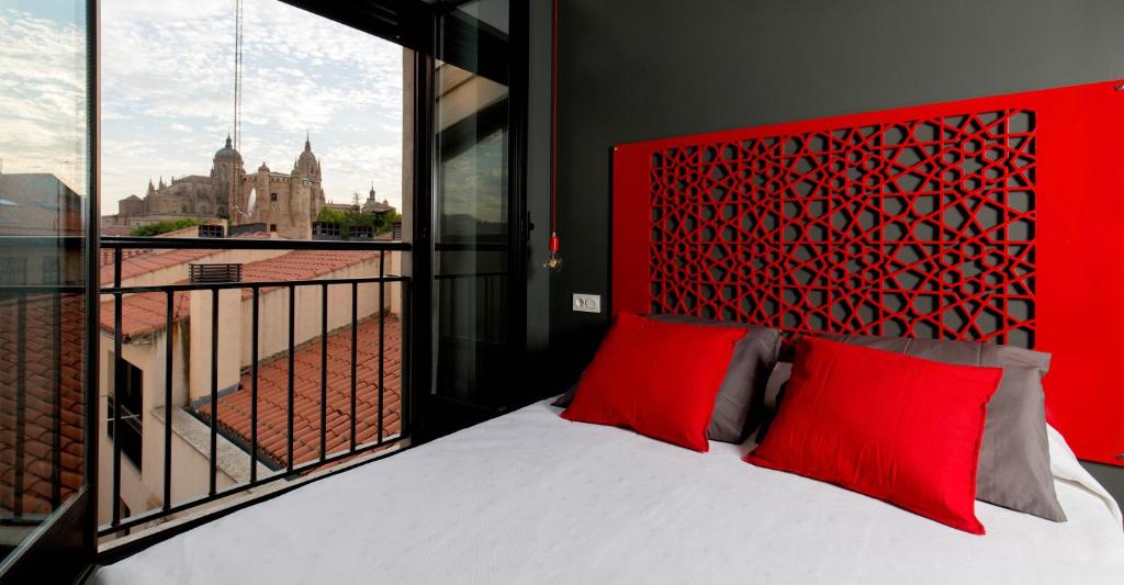 Posteľ alebo postele v izbe v ubytovaní Apartamentos Ele San Justo Plaza