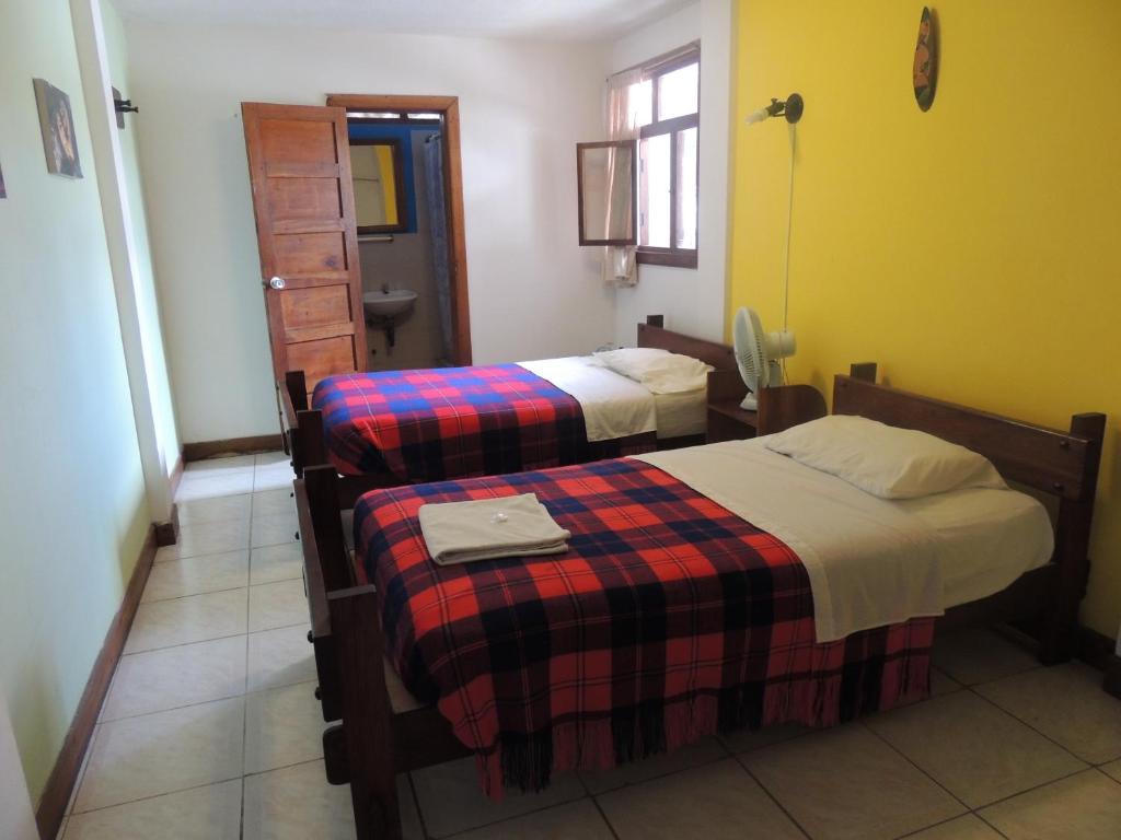 Postel nebo postele na pokoji v ubytování Hotel El Albergue Español