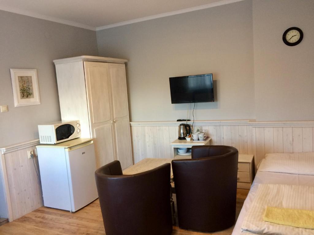 Villa Pod Orzechem w Zaniemyślu - Driepersoonskamer