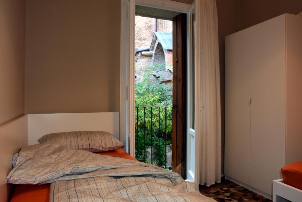 A bed or beds in a room at Studio in Casa Cogollo