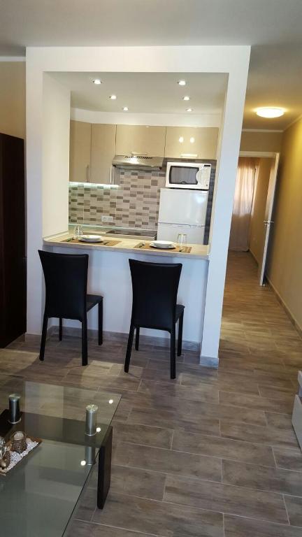 Kuchyň nebo kuchyňský kout v ubytování Simon beach house Los Cristianos