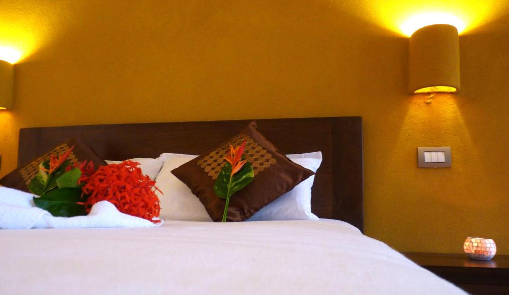 Postel nebo postele na pokoji v ubytování Manala Hotel