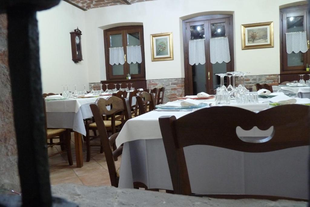Reštaurácia alebo iné gastronomické zariadenie v ubytovaní Agriturismo Maria Cristina