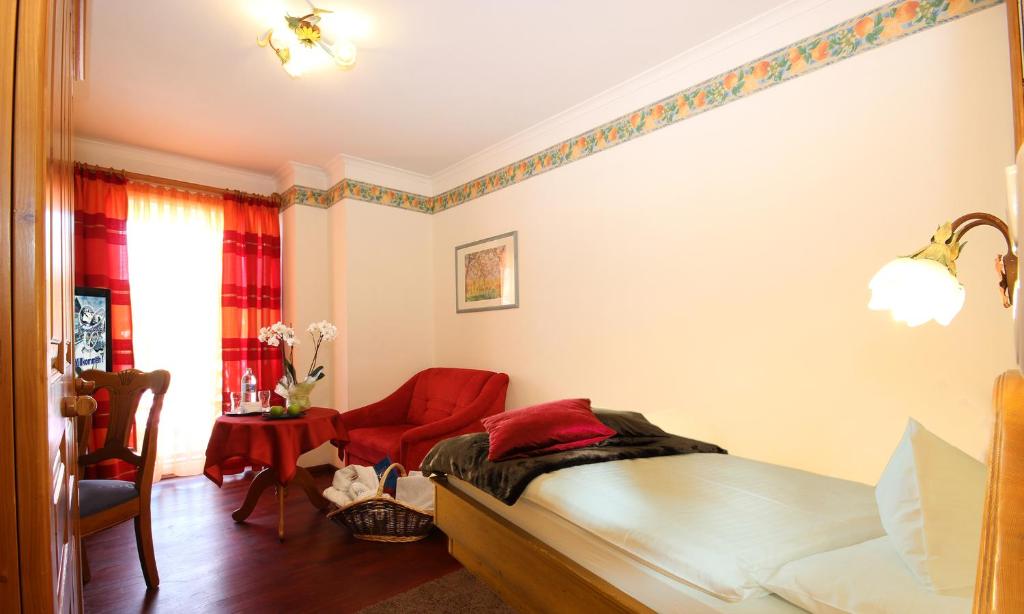 Postel nebo postele na pokoji v ubytování Sporthotel Cinderella