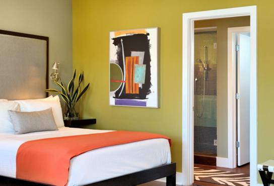 Postel nebo postele na pokoji v ubytování Truman Hotel