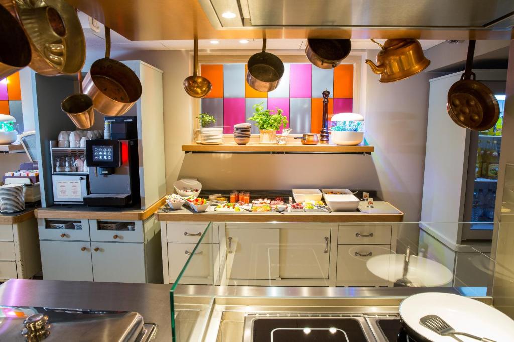 Kuchyň nebo kuchyňský kout v ubytování Hotel Boehler
