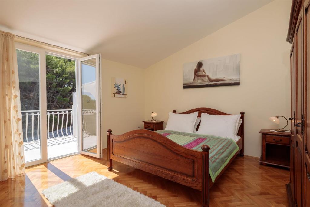 Posteľ alebo postele v izbe v ubytovaní Apartments and Room Alen