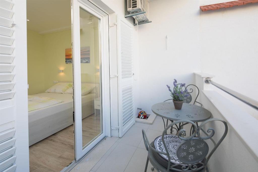 Posteľ alebo postele v izbe v ubytovaní Apartments and Room Alen