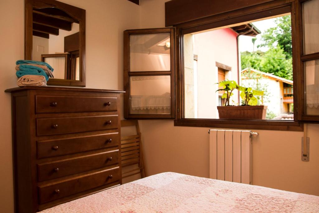 Postel nebo postele na pokoji v ubytování Casa Rural La Regoria